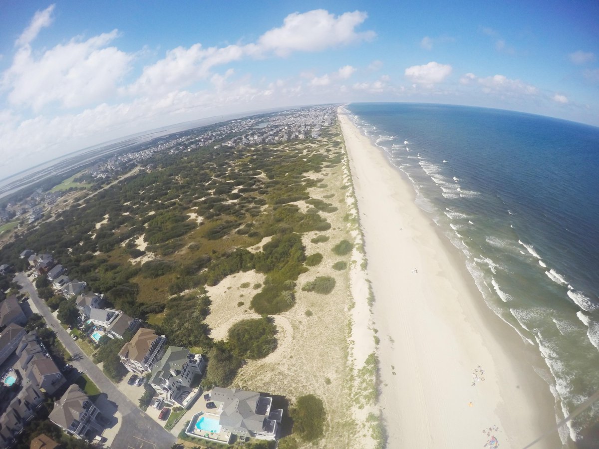 OnTargetDesign's tweet photo. Kite + GoPro makes a great drone! #OBX #OuterBanks #SkyHigh #OTD2OBX #OTDesign #Photography http://t.co/cgweU2gIRS