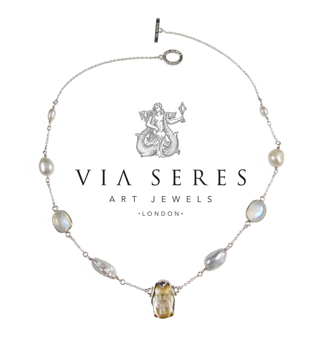 viaseres's tweet photo. #Guanyin #bodhisattva Goddess of compassion necklace. Monstone glass &amp; pearls #jewelry #jewellery exhibited #IJL2015 http://t.co/g1YtrQ2JPm