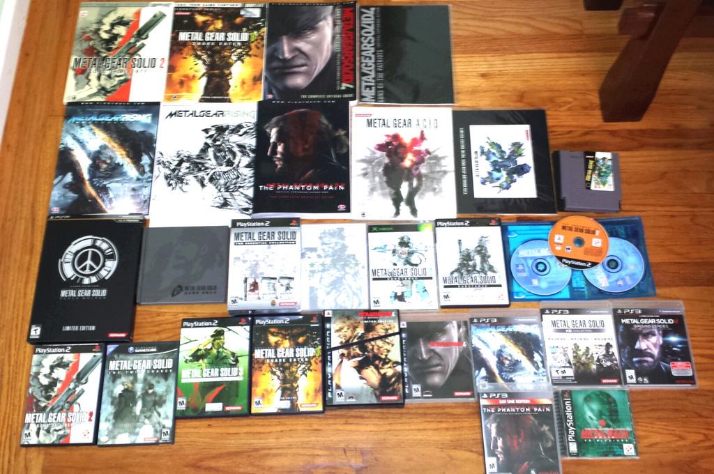 HEOH_KIM's tweet photo. 1 more pic of my #MGScollection 😊😊😊 with all my books too. ( I forgot the gameboy game and PSP case again...gah) http://t.co/6DoqxSZVkD