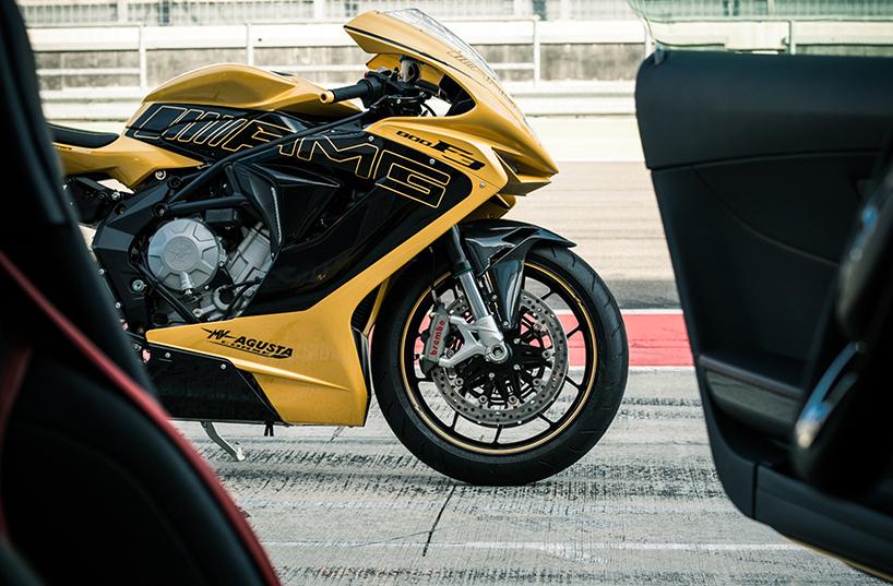 designboom's tweet photo. together mv agusta and @MercedesAMG create high-performance show #bike http://t.co/8D1GytmijZ http://t.co/8rV9YfwE09