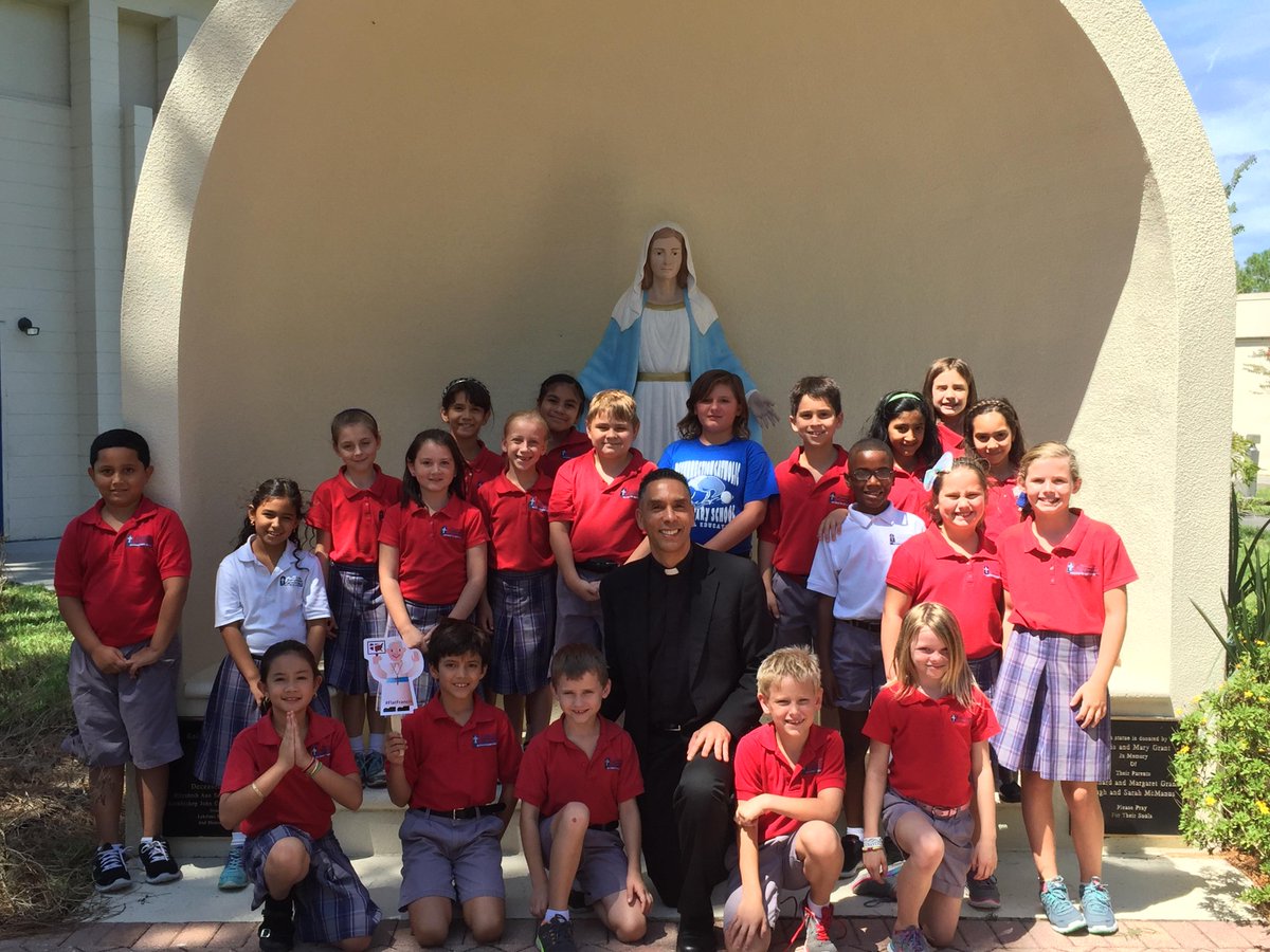 RCSeagle's tweet photo. #flatfrancis RCS gr 3 at Mary's Grotto with Fr. Ivan Olmo praying for Pope Francis http://t.co/WI3bFqy32J