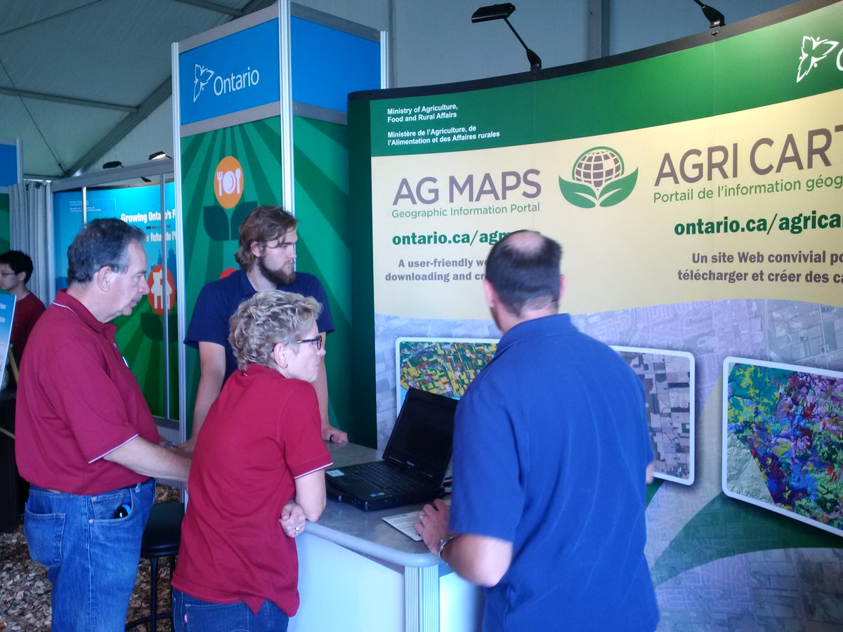 peter_cleary's tweet photo. Long after the formal ceremonies ended, @Kathleen_Wynne and @JeffLeal_MPP are still touring the #IPM15 #onpoli http://t.co/by230BBSwL