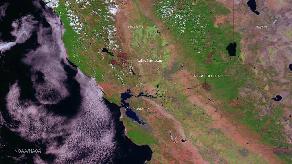 ilike_mike's tweet image. Incredible satellite image from @NOAA of the scarred earth from #ValleyFire &amp;amp; #ButteFire.