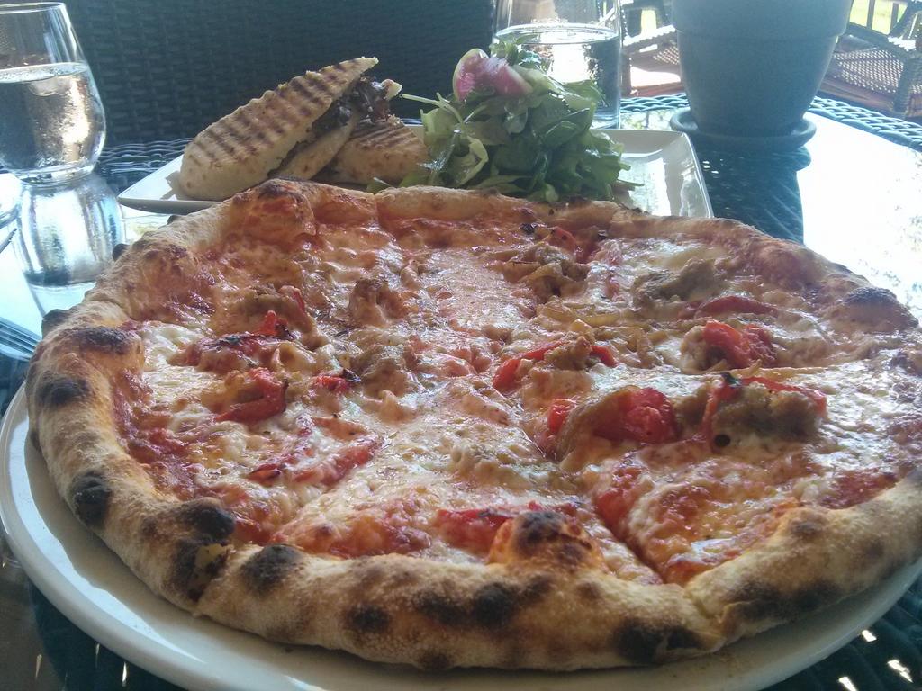 NiagaraSnob's tweet photo. Lunch on the patio at @2SistersVine Kitchen 76. Beef Carpaccio, Steak Panini &amp; Spicy Sausage Pizza + @SilversmithBrew http://t.co/Bo8Haiz58b