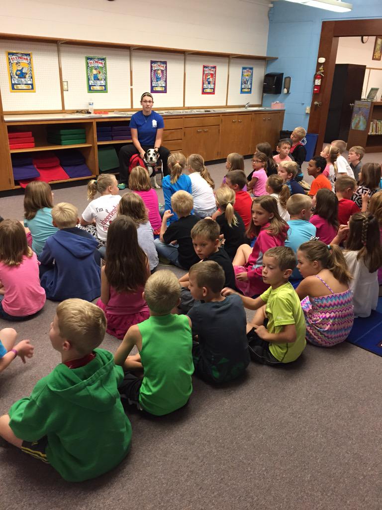 2nd graders had a visit today from Sabrina, a therapy dog, to go with our story "Dogs" this week!