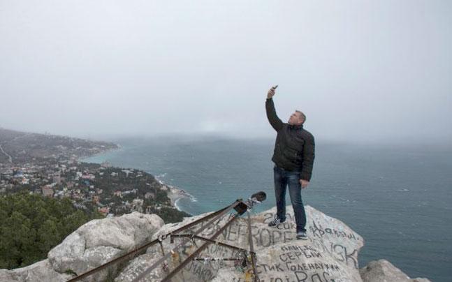 IndiaToday's tweet photo. Selfies cause more deaths than shark attacks! http://t.co/MK8njHce1a http://t.co/w3q45SSzQz