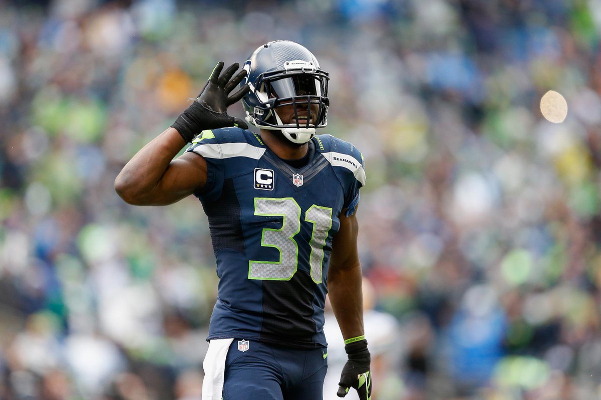 SportsCenter's tweet photo. THIS JUST IN: Seahawks safety Kam Chancellor is ending his holdout and will return to team. (via @stephenasmith) http://t.co/lA0XOvrqR3