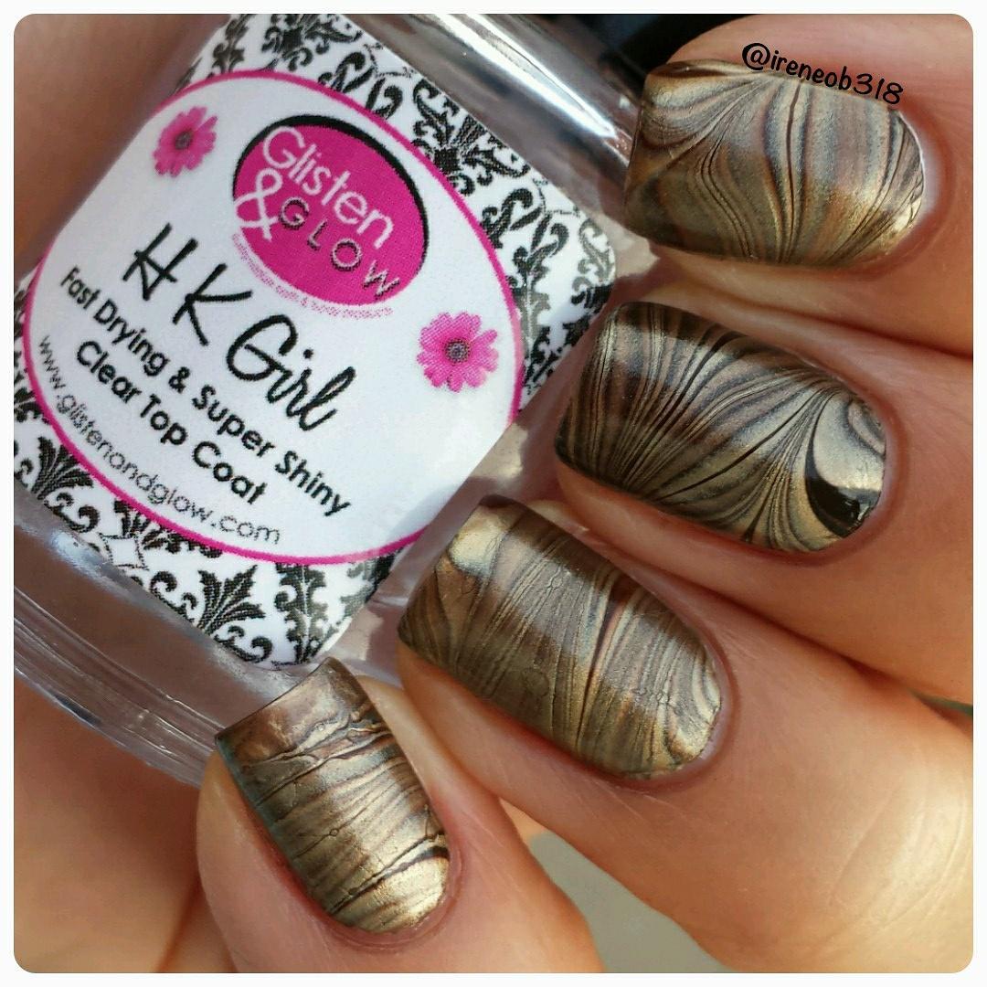 ireneob318's tweet photo. colors used are @NicoleByOPI 'Promises In The Dark' &amp; 'Better After Dark' and @SinfulColors_NP 'Gold Medal'. http://t.co/W3IVFDHuad