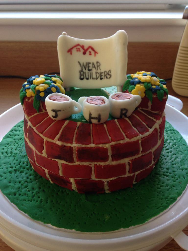 WearBuilders's tweet photo. Little present from Freda and Bernie. It'll be a shame to actually eat it - but we will. #WearBuilding http://t.co/rkRsgEaYZ6