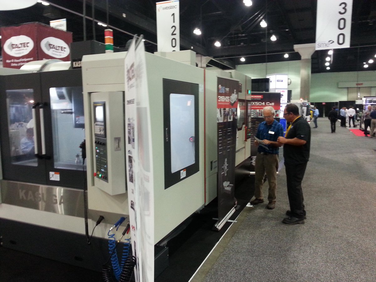 CaltecUSA's tweet photo. Westec pre-show with Caltec Sales &amp; Service engineer (left) Manuel Nesrala going over the Quaser MF500 specs http://t.co/PoQtqdTFZ1