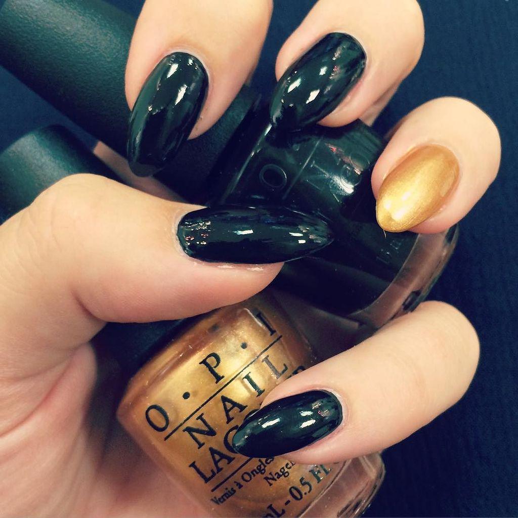 rainbowsnfairyd's tweet photo. Latest @opinailsuk mani Gold + Black 💅 http://t.co/y78L3yMqrC http://t.co/YFqZcIil05