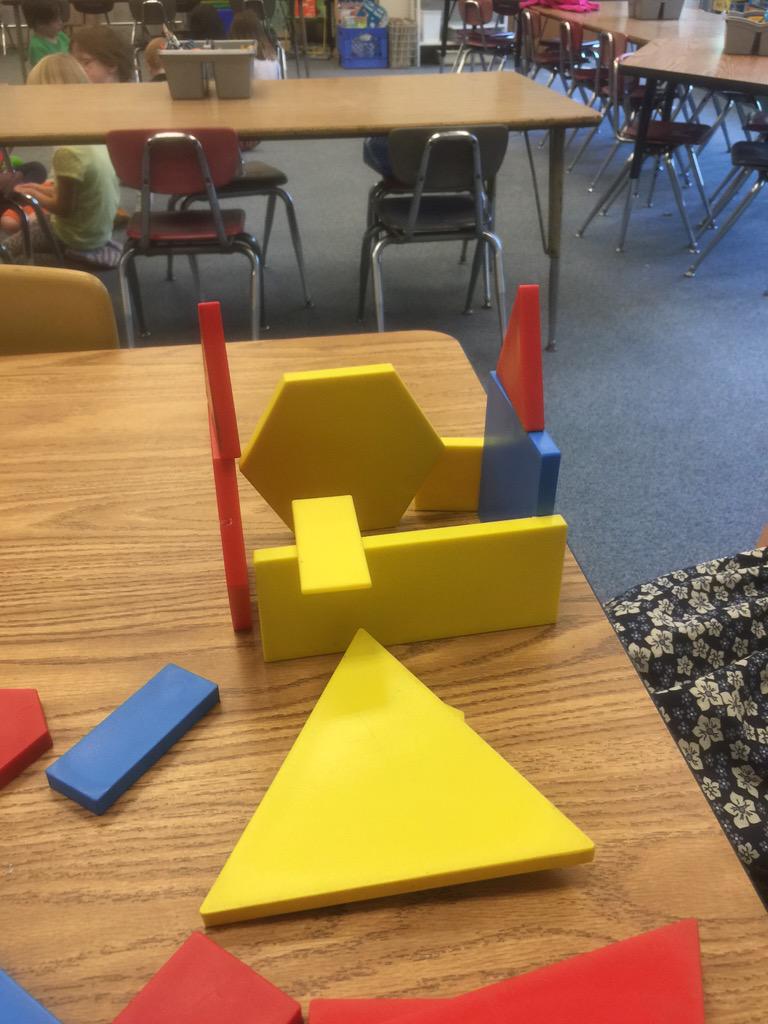 Q: Sort these objects any way and tell me how you sorted them. A: I made a castle! Kindergarten rocks! #ztroar