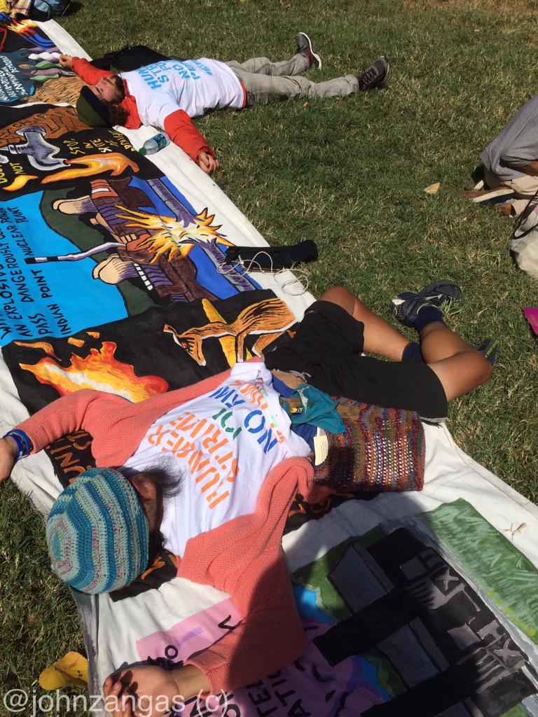 johnzangas's tweet photo. #BXEfast Jimmy and Mackenzie rest on their Fracking banner at McPherson. Their 18-day fast goes 2 more days @jimseng http://t.co/7jy9dkoTEa