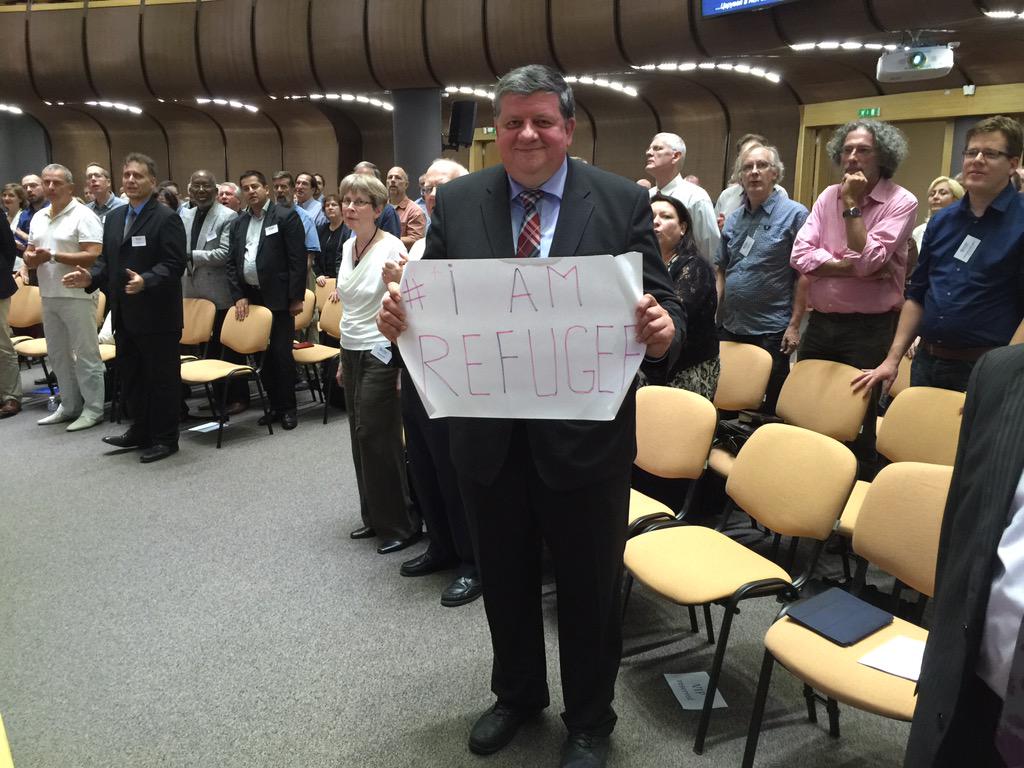NabilCosta's tweet photo. #EBF president held banner "I am a refugee" at the end of his sermon!#love_the_stranger #EBFcouncil2015 @HelleTweet http://t.co/1nHAXxcqMU