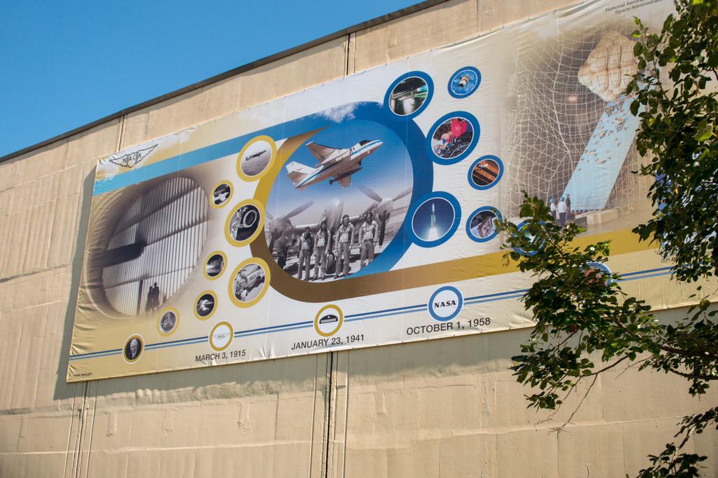NASAglenn's tweet photo. It's a banner day @NASAglenn! We unveiled a new large banner celebrating our #NACA100 and space exploration heritage. http://t.co/OYYjibG0Ce
