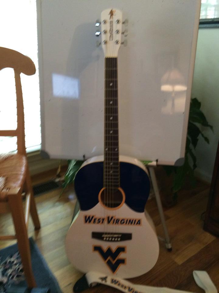 JSWVUAlumni's tweet photo. Get a chance to win this awesome WV guitar @BrannigansNJ during the WVU vs MD game. Next week it is @crabsclawinn http://t.co/RVF1B4c3mD