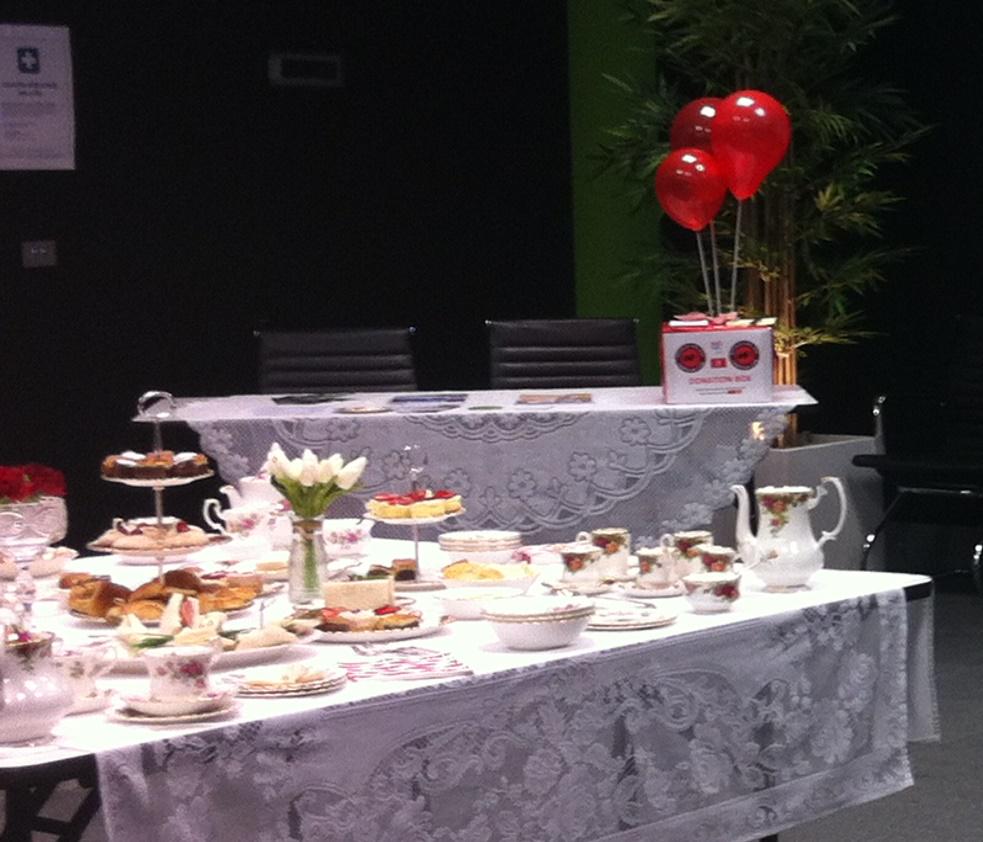 theroareffect's tweet photo. The beautiful High Tea hosted by C3 Casey last week for the #revolutionredcampaign http://t.co/10Gm1wMtWS