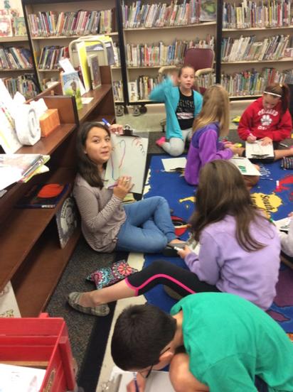 orchardtech's tweet photo. digital footprint unit has begun-Orchard. 5th graders illustrate footprints with online activities  named inside them http://t.co/8tgumAiuC3