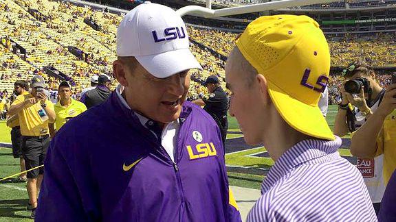 espn's tweet photo. LSU, Les Miles fulfill dream of teen with cancer, giving him his “happiest day ever”: http://t.co/C9N03qvgFE http://t.co/JHRyKWPrYD