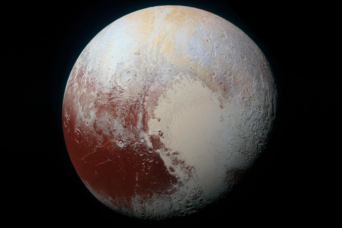 engadget's tweet photo. The Big Picture: A colorful and dazzling view of Pluto http://t.co/s78Adr7Sva http://t.co/bHnkh0QjWS