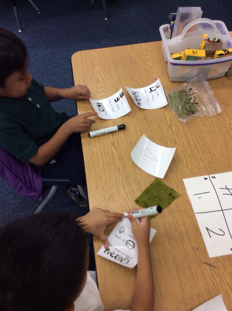 MissHeffer28's tweet photo. We identified attributes of shapes today and shared our answers using Round Robin @KaganOnline http://t.co/Z5F0FRDNu6