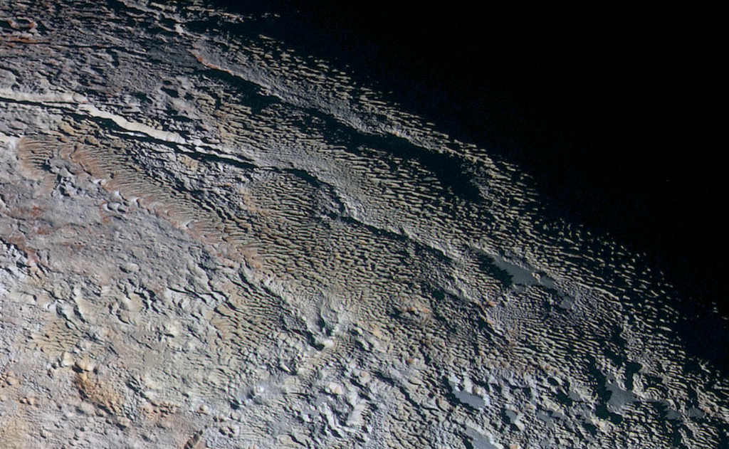 WIRED's tweet photo. NASA’s highest-res photos yet show Pluto’s bizarre geology http://t.co/fzZelWplaz http://t.co/WoHnQZnV2f