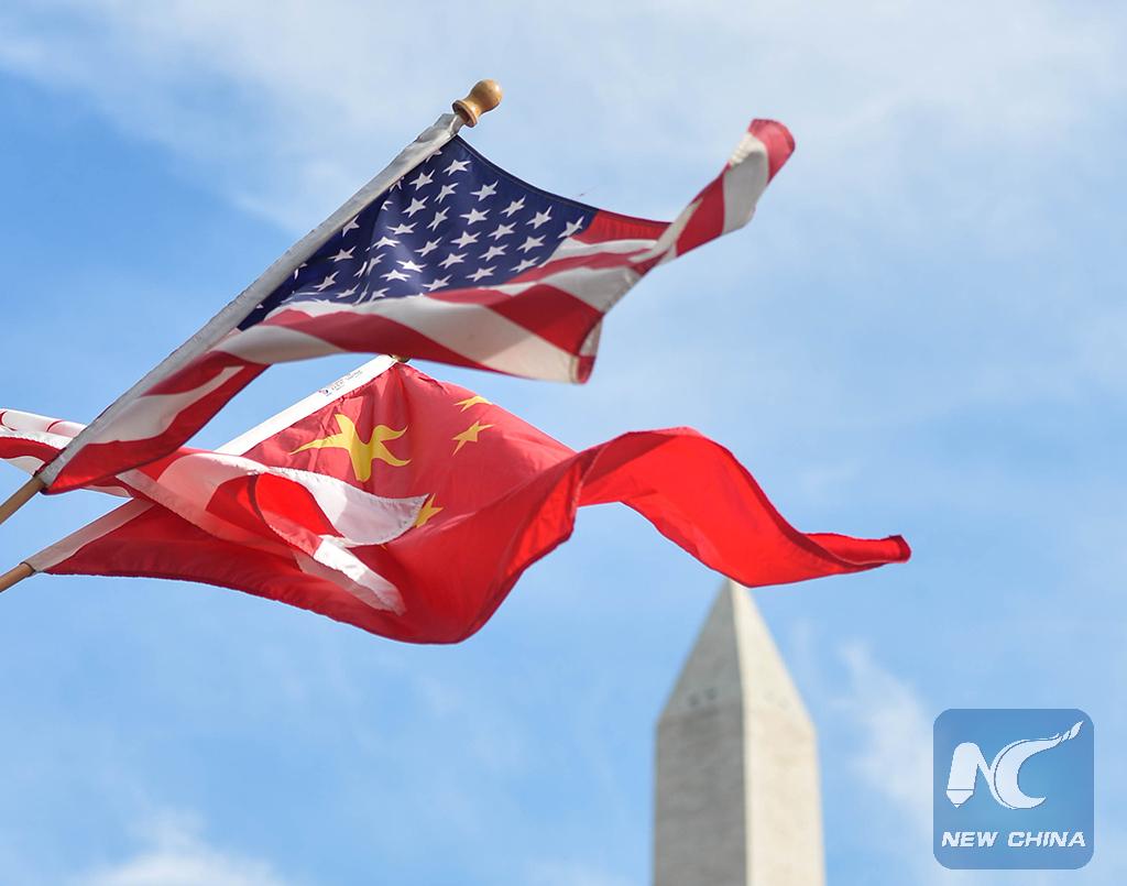 XHNews's tweet image. National flags of China and the U.S. are seen along the street in Washington #XiUSAVisit