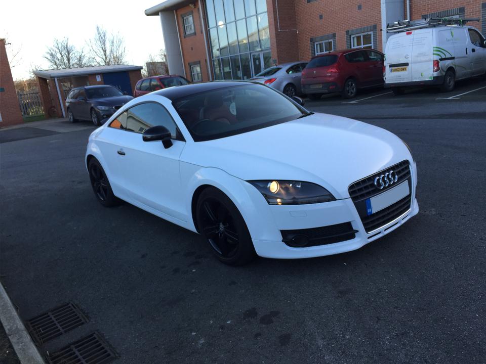 WrapStudios's tweet photo. We did a full colour change wrap on this Audi TT in Gloss White, with gloss black accents! #wrap #wrapped #audi #tt http://t.co/pcjaw1aAK3