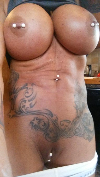 2 pic. #MILF #BigTits #Piercings #FriskyFriday Here's my boobs and pussy for no real reason at all ;-)