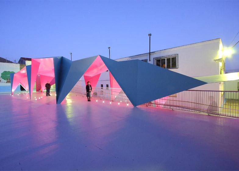dezeen's tweet image. Folded-steel shelter created for a school playground: dezeen.com/2015/06/14/jul… #architecture
