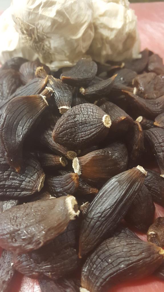 EdwardJSura's tweet photo. Housemade black garlic for #heritagebbq @COCHON555 #preservationkitchen http://t.co/8LpqBazYqL