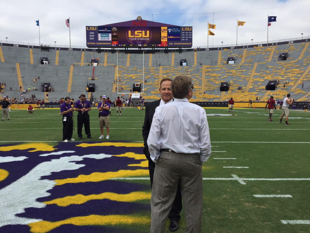 Coach Spurrier and Coach Miles greet each other at midfield. @SC_HBC @LSUCoachMiles #Gamecocks #LSUvsSC