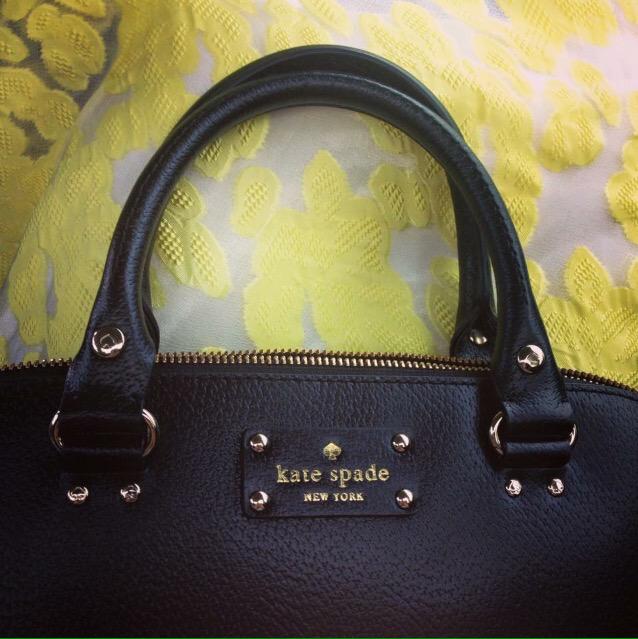 dashinghemline's tweet photo. It's #NationalHandbagDay, what's on your wrist? I've got a little @katespadeny brightening my day #bedashing http://t.co/XRHVKy5xLo