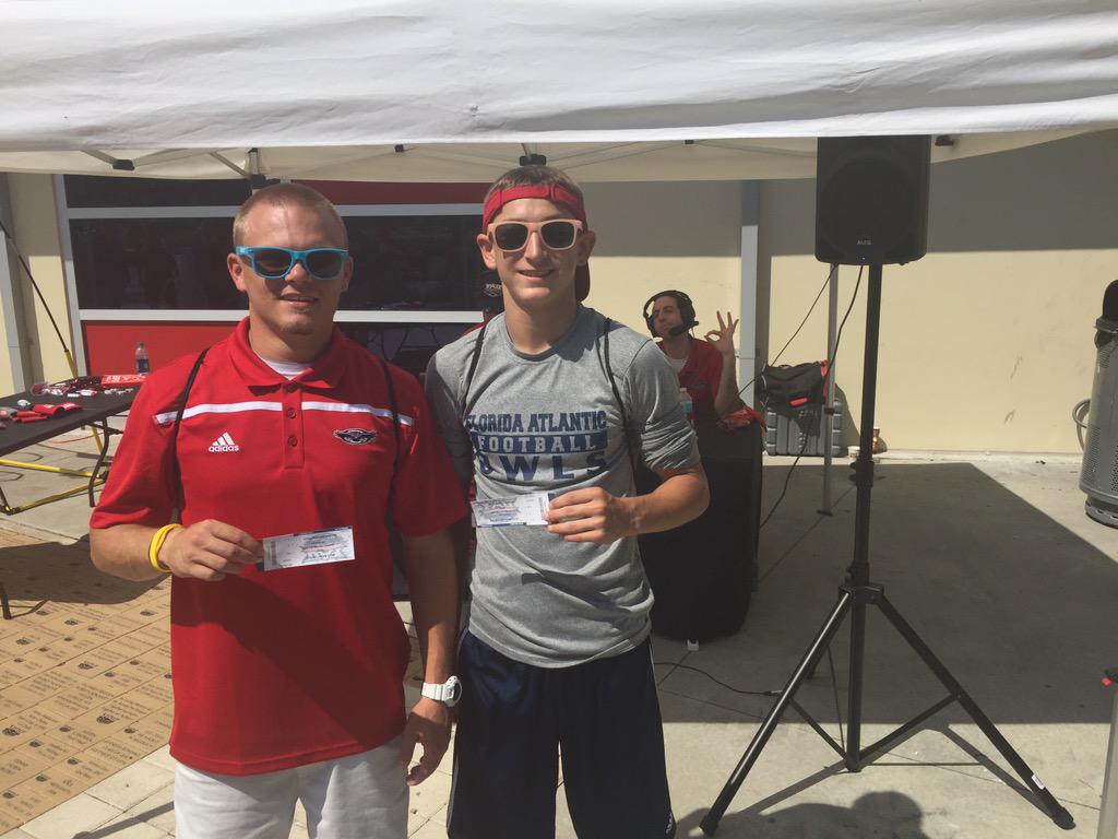 Winner of our party deck tickets, the Stoshak brothers making 10 in a row on our QB toss!