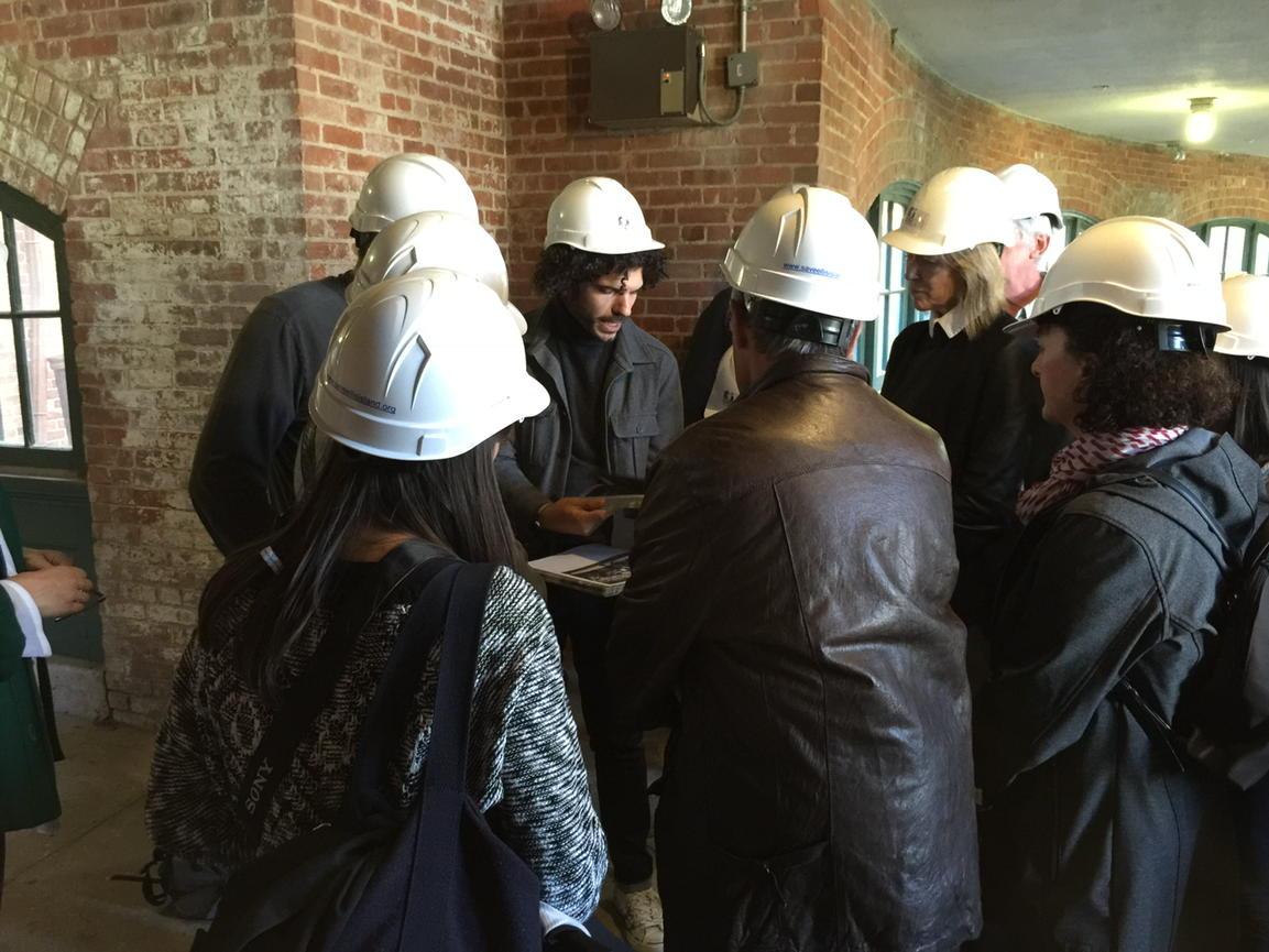 saveellisisland's tweet photo. You missed it! Exciting tour of JR's exhibit in the unrestored hospital on Ellis Island. http://t.co/xnUDPohgKM