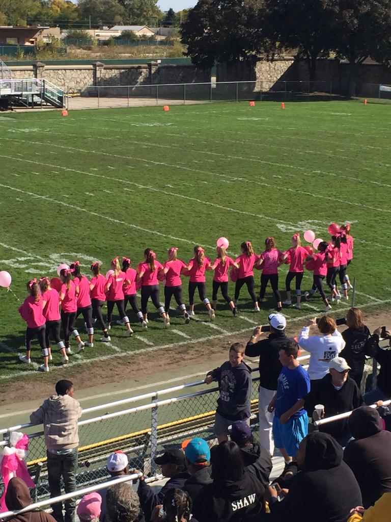 SCHS Cheer and Poms take the field at half time for their Breast Cancer Awareness routine.