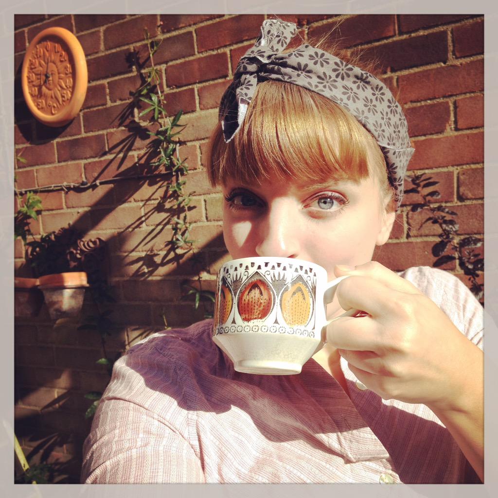 TheGenOffice's tweet photo. Lots of restoration work today! But first, coffee, from my favourite Kathie Winkle cup in the October sun. http://t.co/UkP9PArgI2