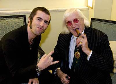 Happy birthday to John Lennon (pictured here with George Martin) 