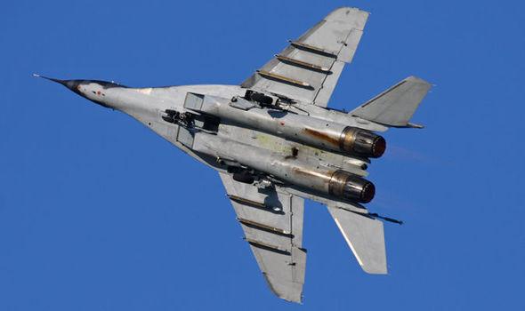 Daily_Express's tweet photo. BREAKING: Russian 'jet SHOT DOWN by Turkish forces after it flew into their airspace' http://t.co/pc0EhRCS3n http://t.co/AEMPLfETGE