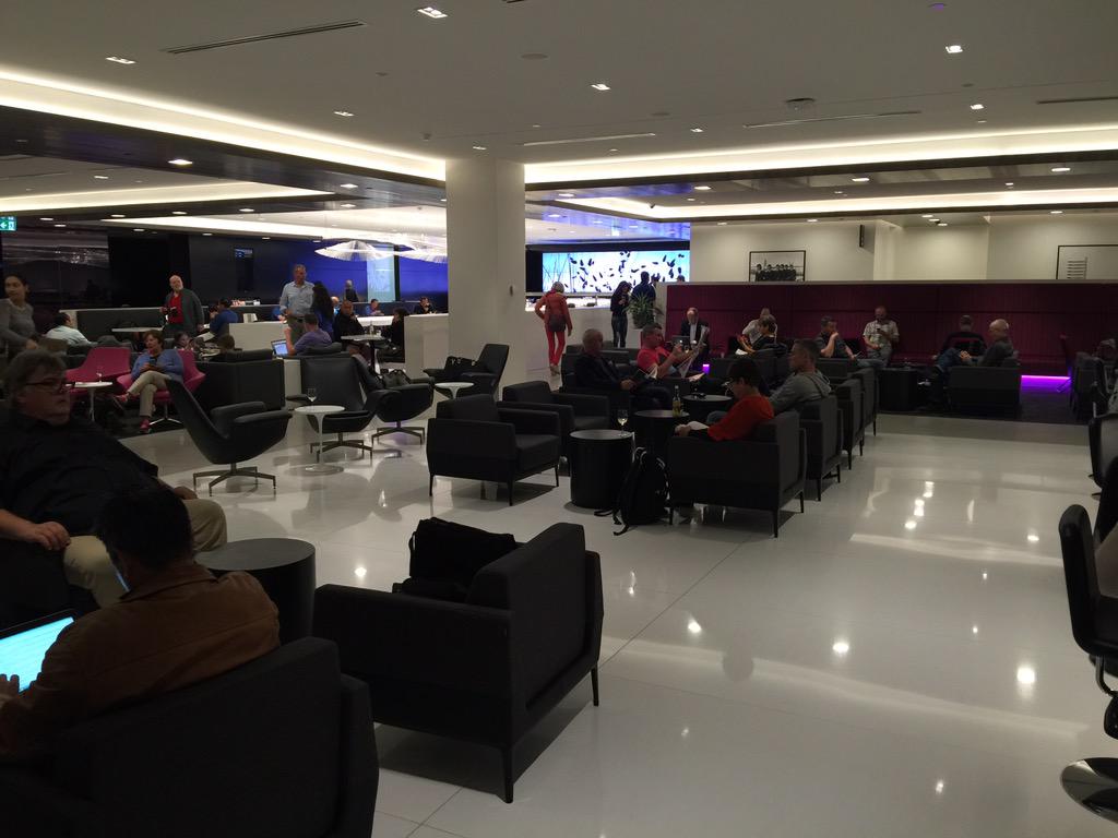 Loving the new <a href="/FlyAirNZ/">Air New Zealand</a> lounge in Auckland, especially the new bar.  Well done with the design.