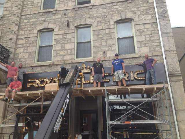 CallDBC's tweet photo. Cheers to good friends giving us a hand putting the new sign @royal_eatery http://t.co/uReG6rEHUM