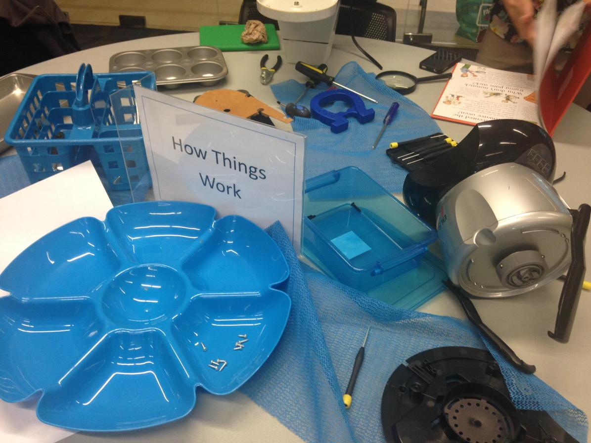 EMSCarlson's tweet photo. Teachers explore how things work as they use tools to take apart common household items. #sd36learn http://t.co/PU2tpjDecy