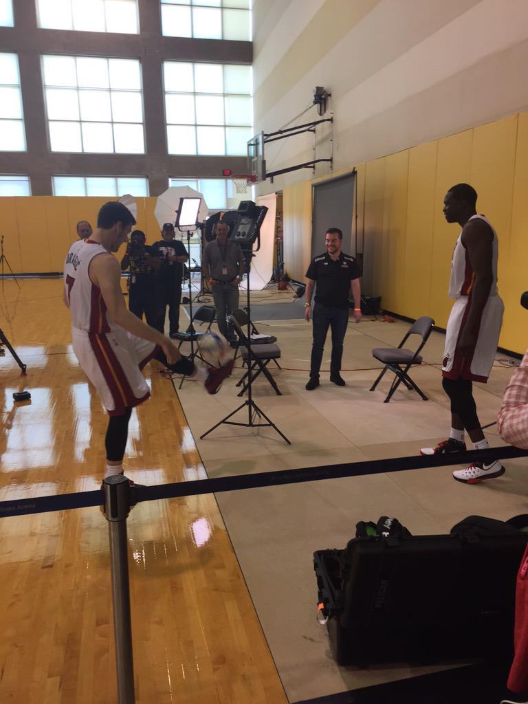 Goran Dragic and Luol Deng kicking the soccer ball around