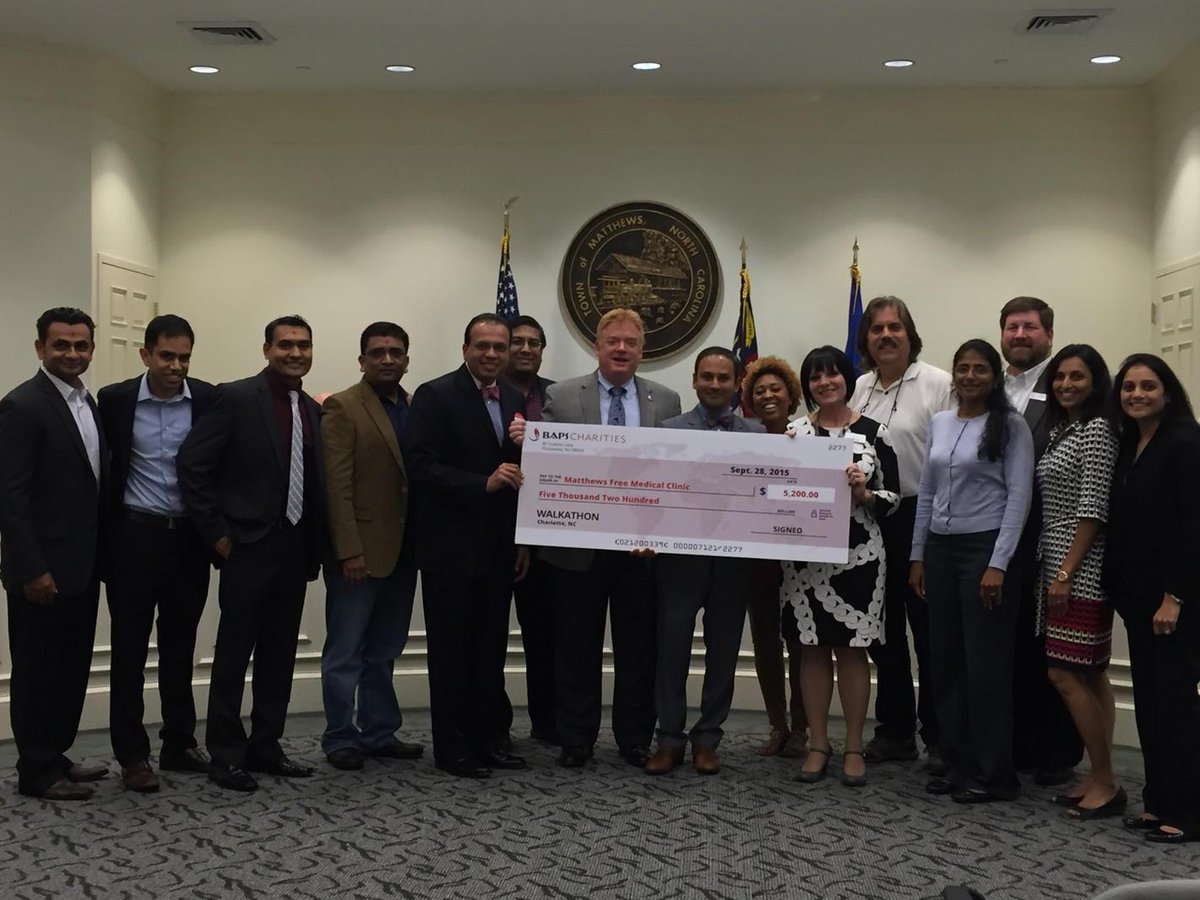 matthewsncgov's tweet photo. BAPS Charities presents proceeds to Matthews Free Clinic from 2015 benefit walk! Wow! http://t.co/YYPEEc90iY