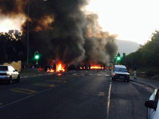 MMthesh's tweet photo. People are protesting in Fish hoek http://t.co/XbQgwVxe7e