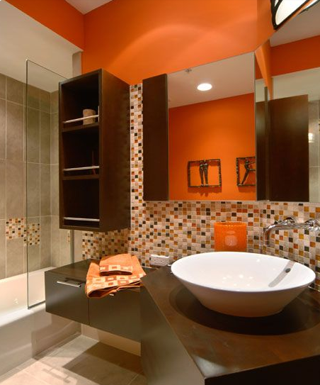 Be bold! Use #orange in your #bathroom to create a statement look. ow.ly/SFfqz #InteriorDesign