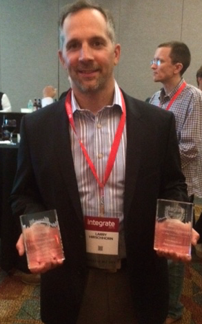 infobldrs's tweet photo. #Integrate2015 was a total success w/ @infobldrs winning big. Here is Larry Hirschhorn w/ the hardware! http://t.co/QKSNgHGSGm