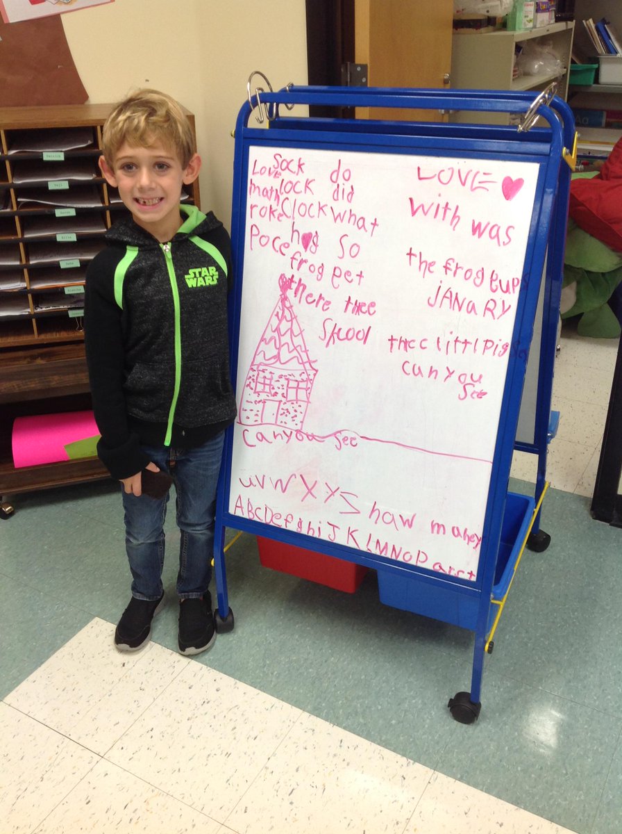 First grader practicing his spelling words during Daily 5 :)