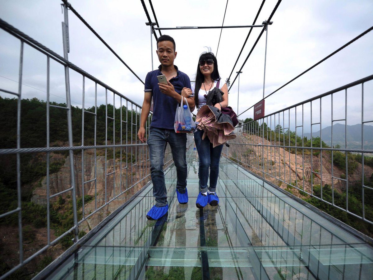 FoxNewsTravel's tweet photo. China opens terrifying glass-bottom walkway dubbed ‘Brave Men’s Bridge’ | http://t.co/WmKAyOwfgE http://t.co/KsqBpt42kf