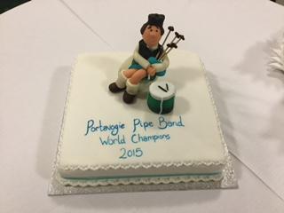 MMcIlveenDUP's tweet photo. Celebrating their success at Parliament Buildings with ...cake ...and ...more cake @PVogiepipeband #WorldChampions http://t.co/PVHsPCg2hd